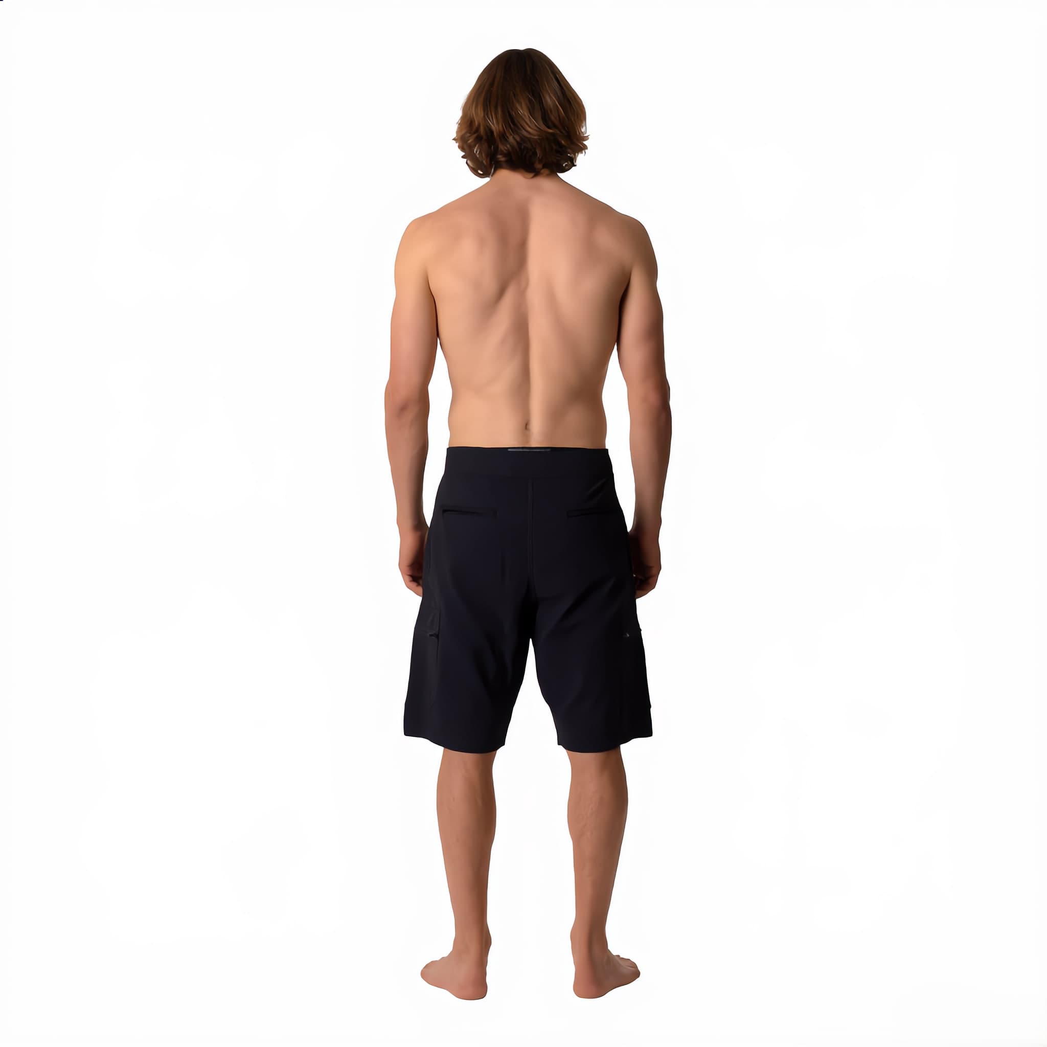 The boardshort worn, back view, showing the welt pocket and the leg opening.